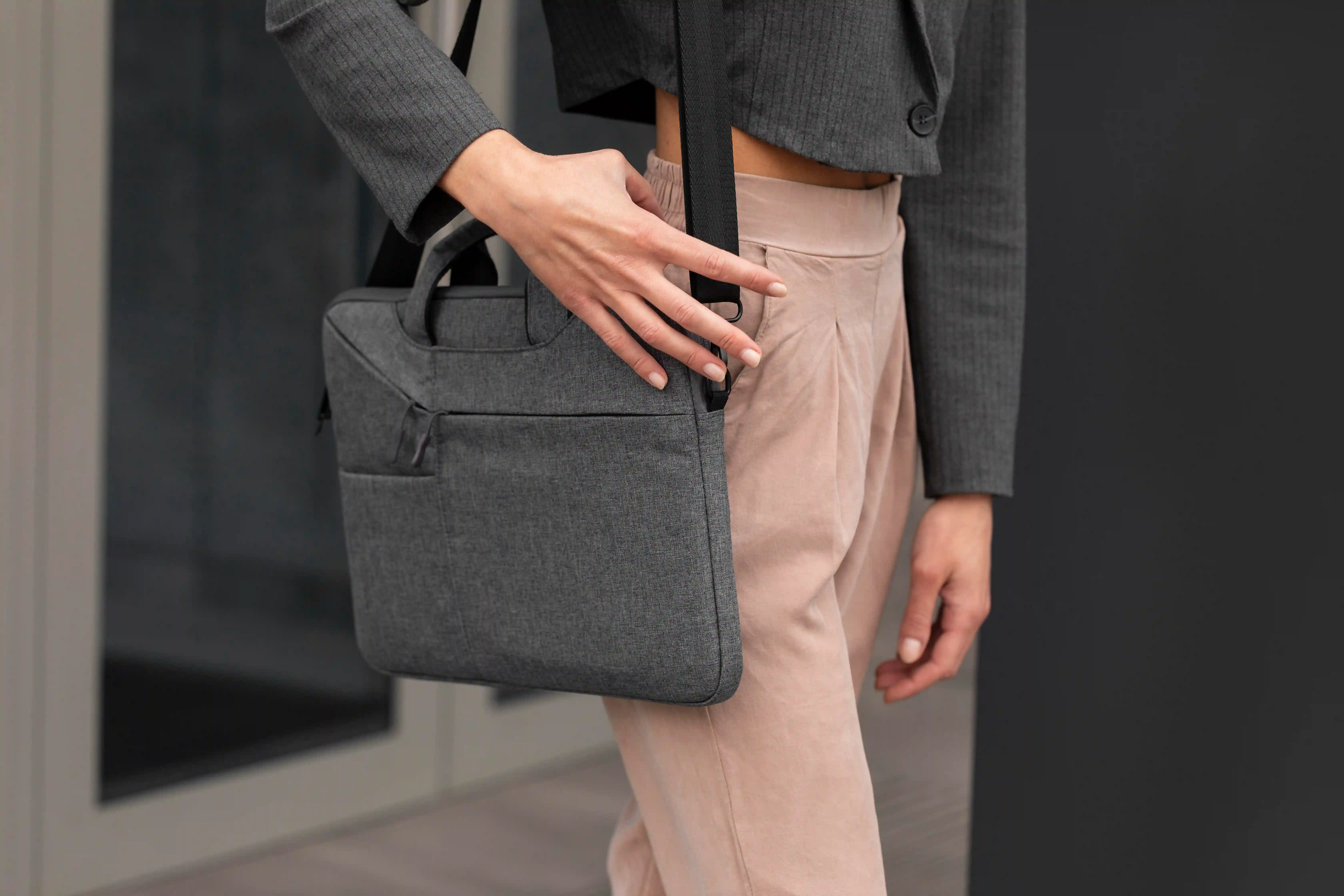 woman-standing with a portfolio
