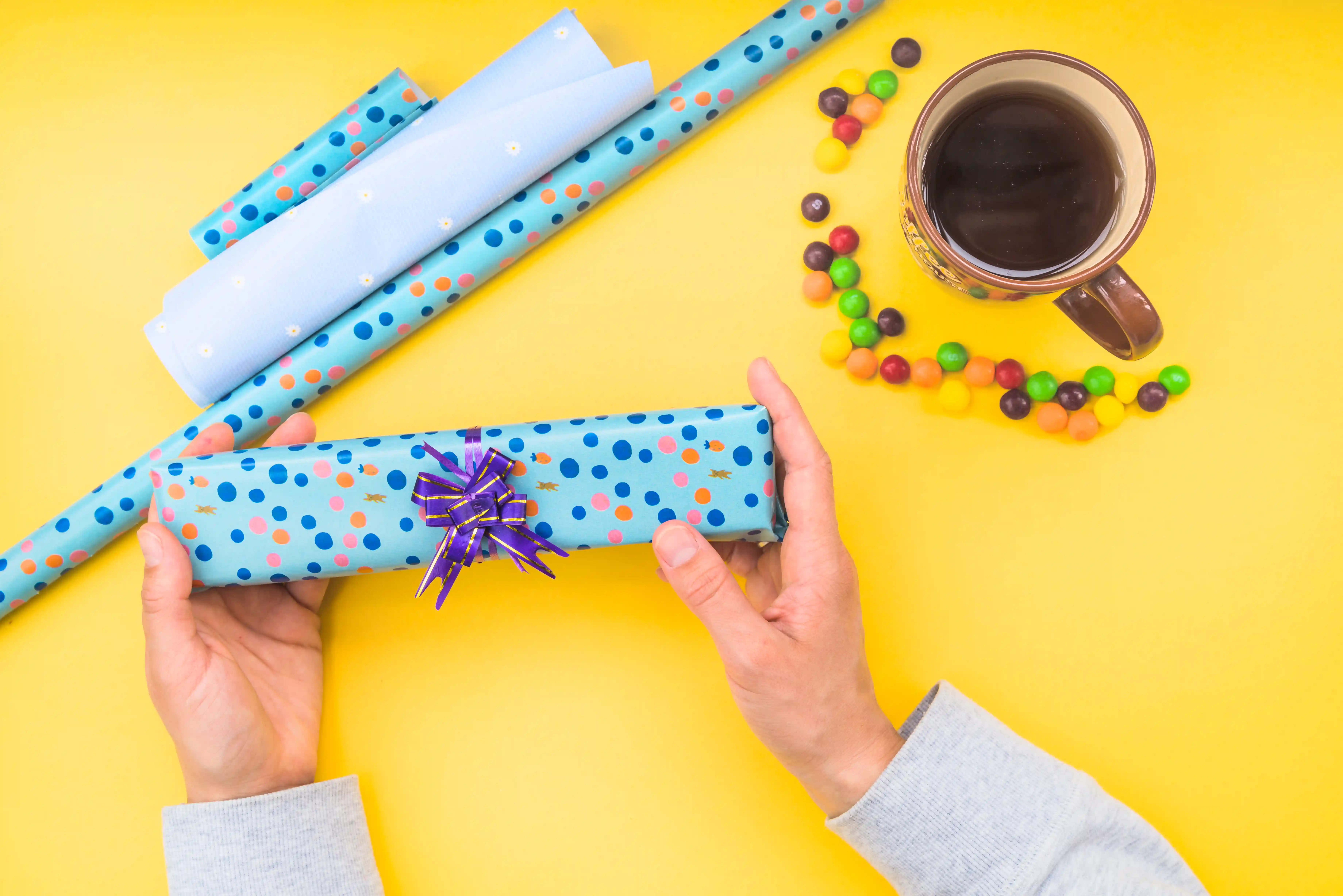 hands-holding-april fools day-gift-box