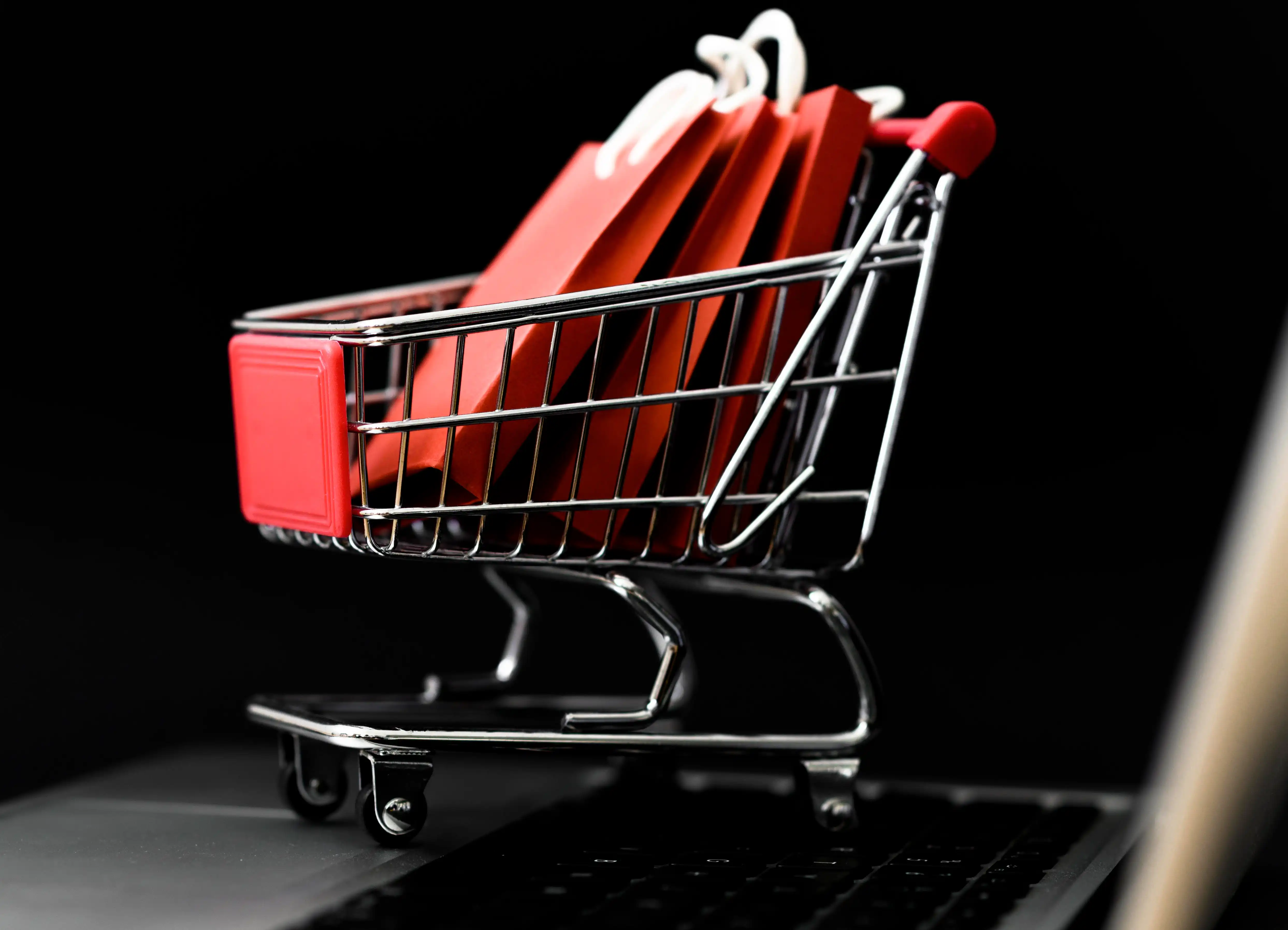 front-view-cyber-monday-shopping-cart-with-bags