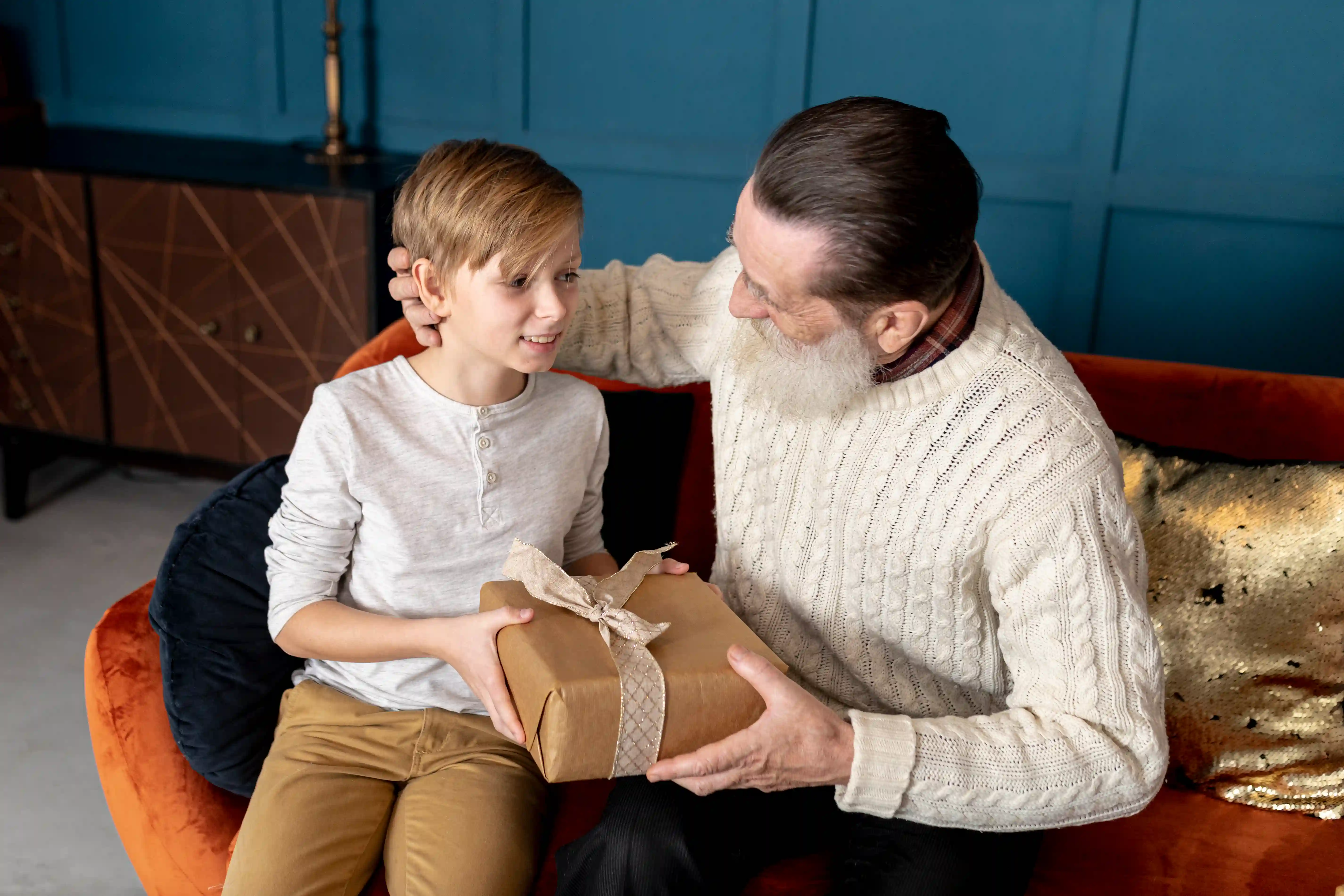 little-boy-giving-his-grandfather-gift