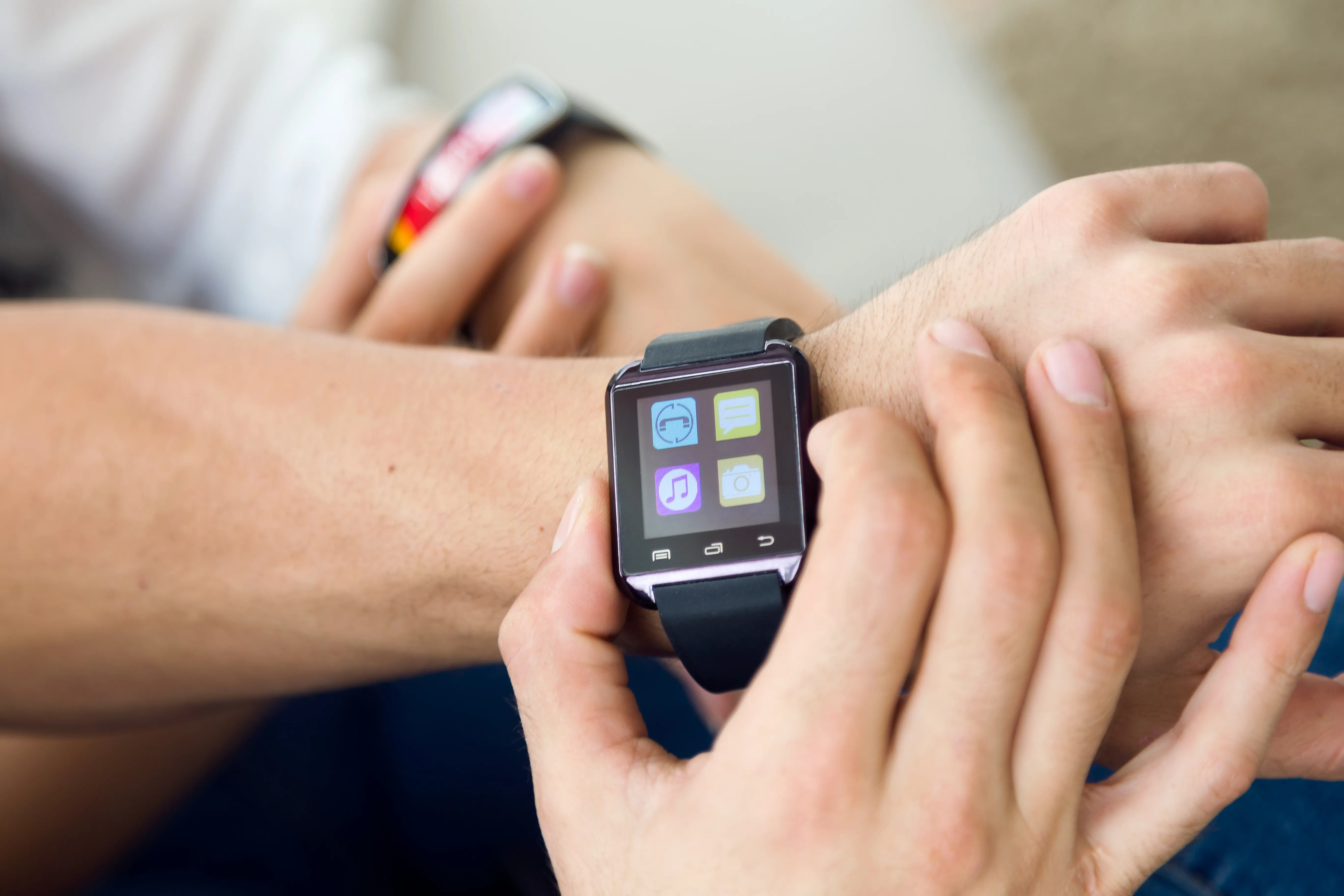 man-using-smartwatch
